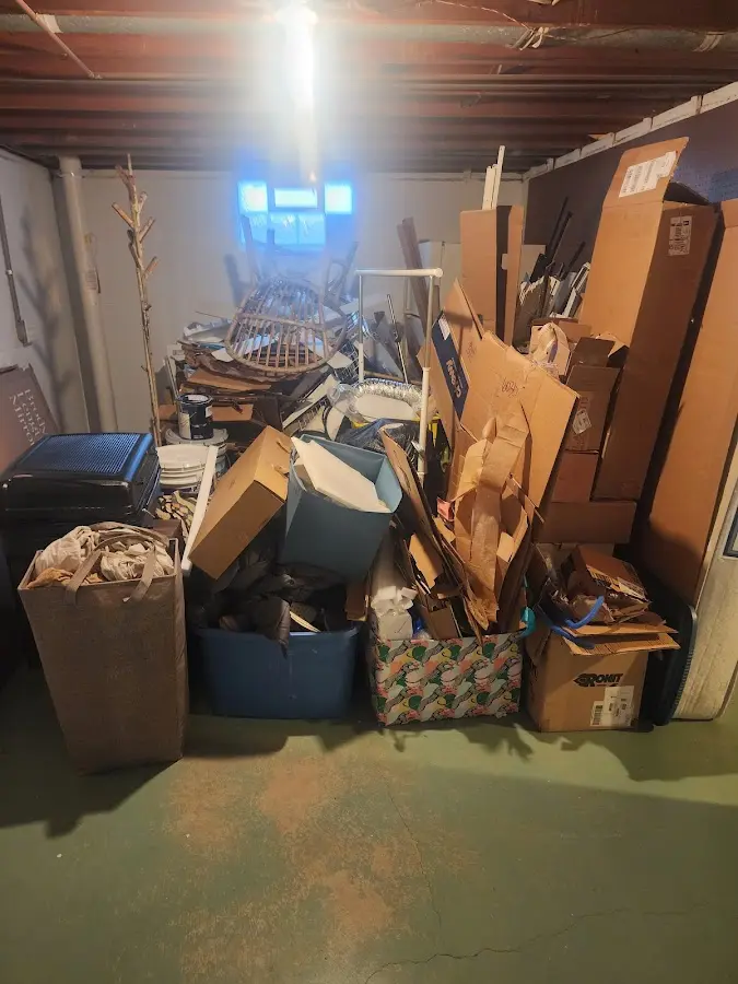 Roll-off dumpster container at job site for 2 Yard Dumpster Rental in The Meadows